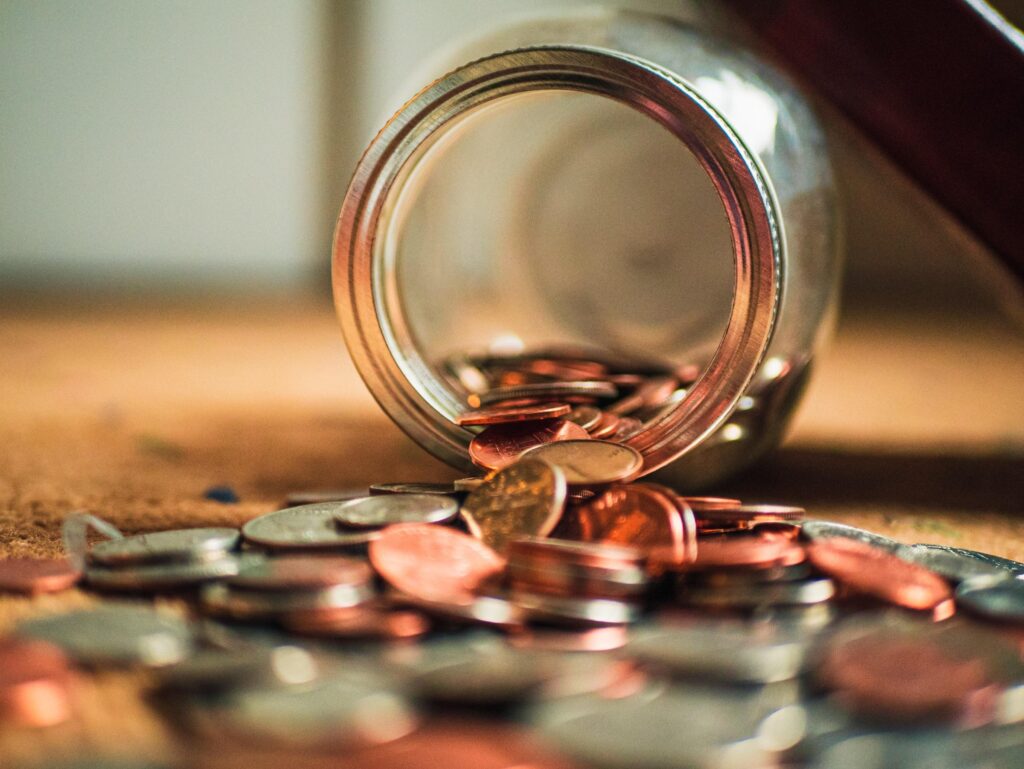 Jar of coins tipped over